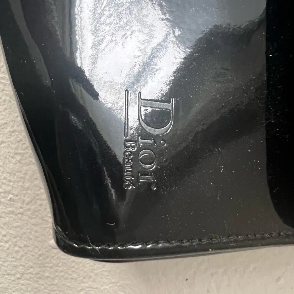 Dior Glossy Black Makeup Bag with Ribbon Detail.